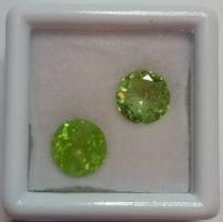 2x Péridots ronds 8 mm - Valeur 170.- Fr