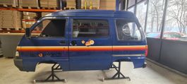 Halbes Auto Daihatsu Porter für Aussteller und Bastler