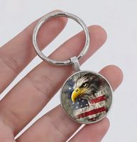 SCHLÜSSELANHÄNGER *ADLER,US- FLAGGE*, LEGIERUNG,GLAS,NEU