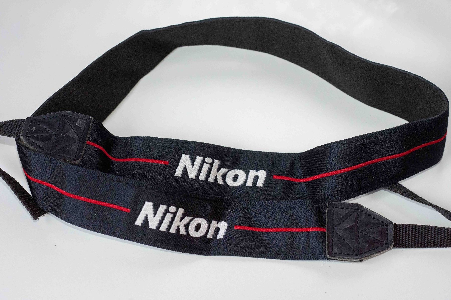 Nikon Altri Accessori: Kameragurt Nikon 100cm lang, 3cm breit – Usato da Schwerzenbach venduto da floridan