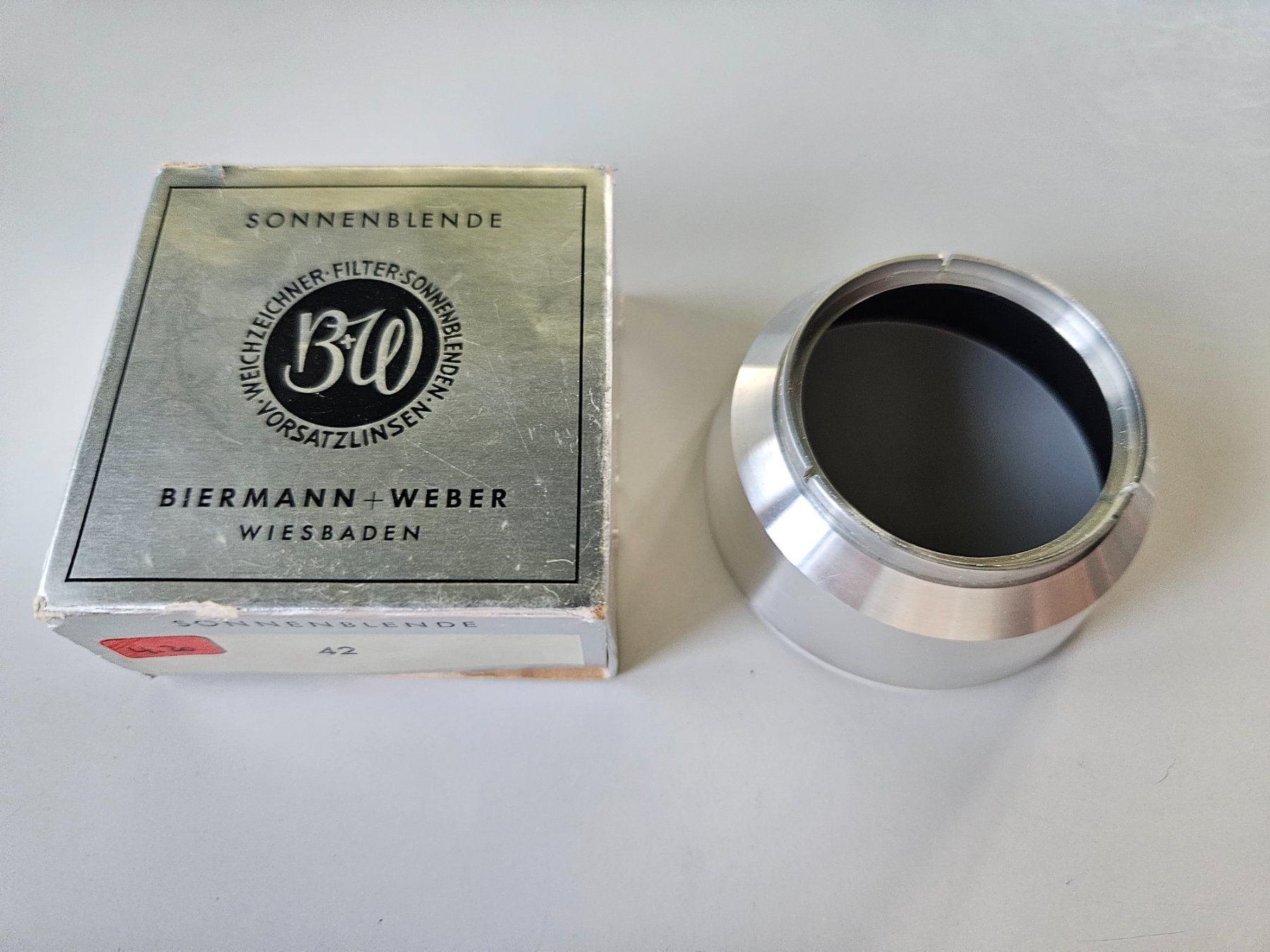 Appareil photo: Pare-soleil Biermann+Weber, 42 vintage – D'occasion à Echandens par annegug