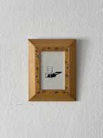 Cadre en bois vintage avec ornements florales