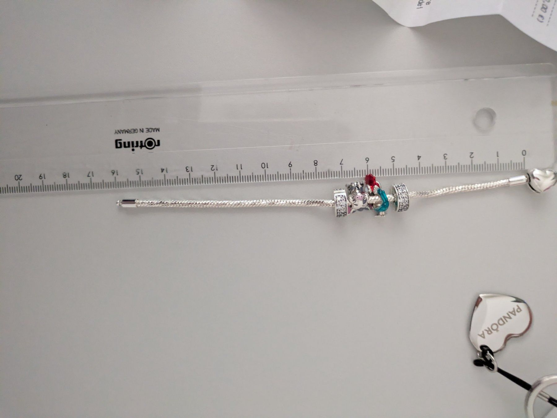 Pandora Bracciali & Braccialetti: Pandora Armband mit 3 Charms Sterling Silber 925 – Nuovo e nell'imballaggio originale da Leibstadt venduto da Mareli18 1