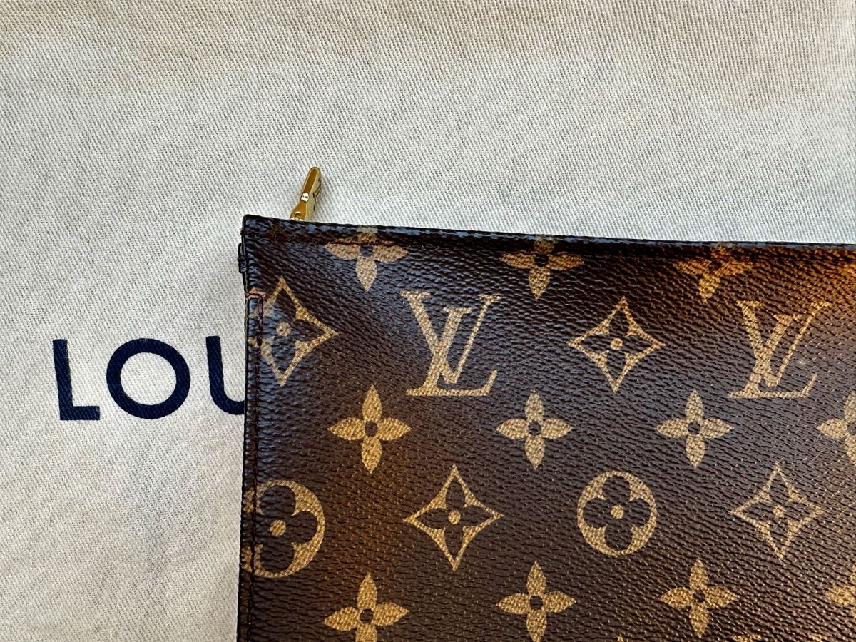 Louis Vuitton Borse: Louis Vuitton Pochette Monogram Canvas neuwertig – Usato da Uster venduto da TinA.. 1