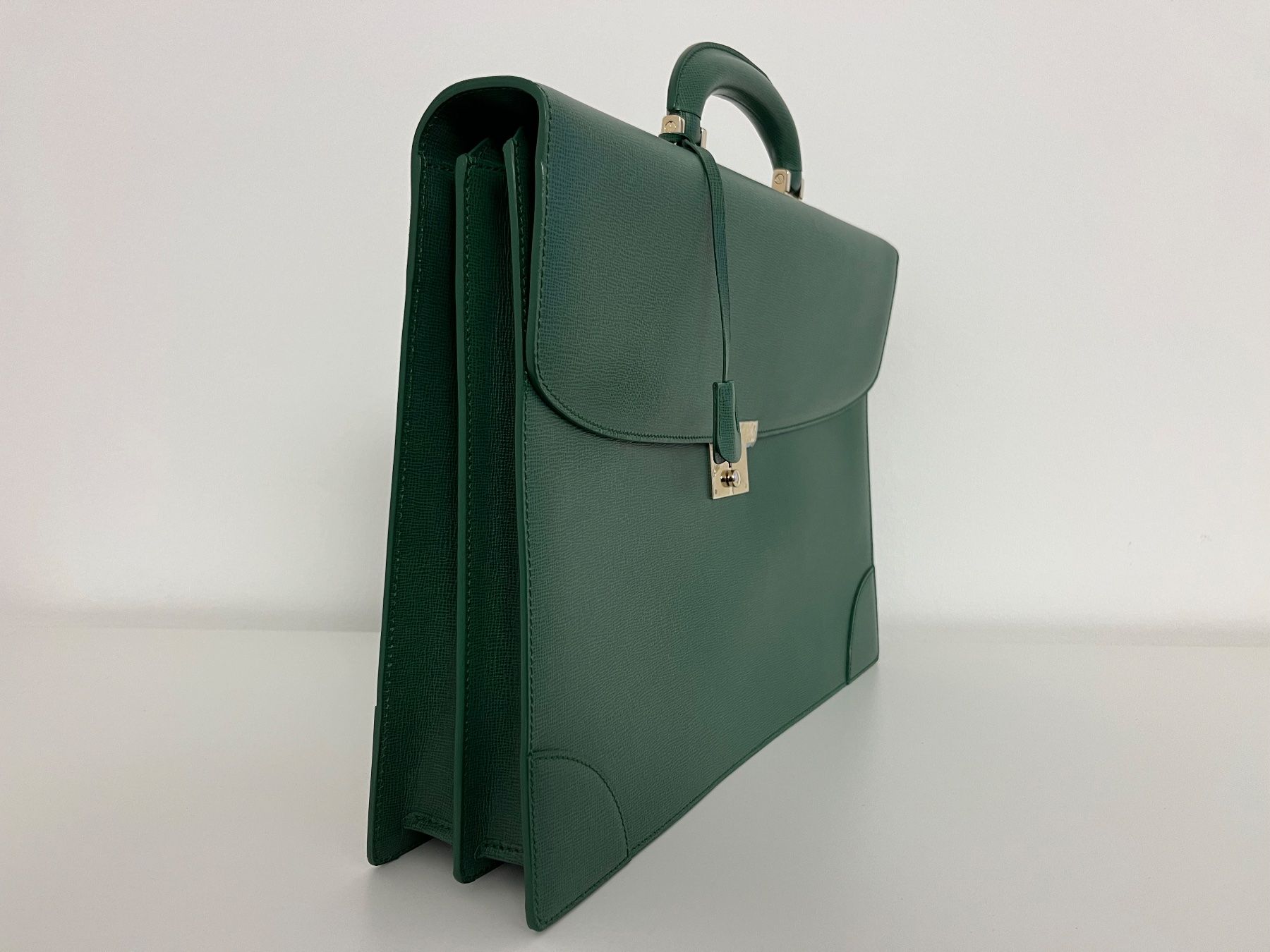 Valigie & Borse: VALEXTRA ROLEX green leather briefcase gold plated locking – Usato da Lugano venduto da LVC 2