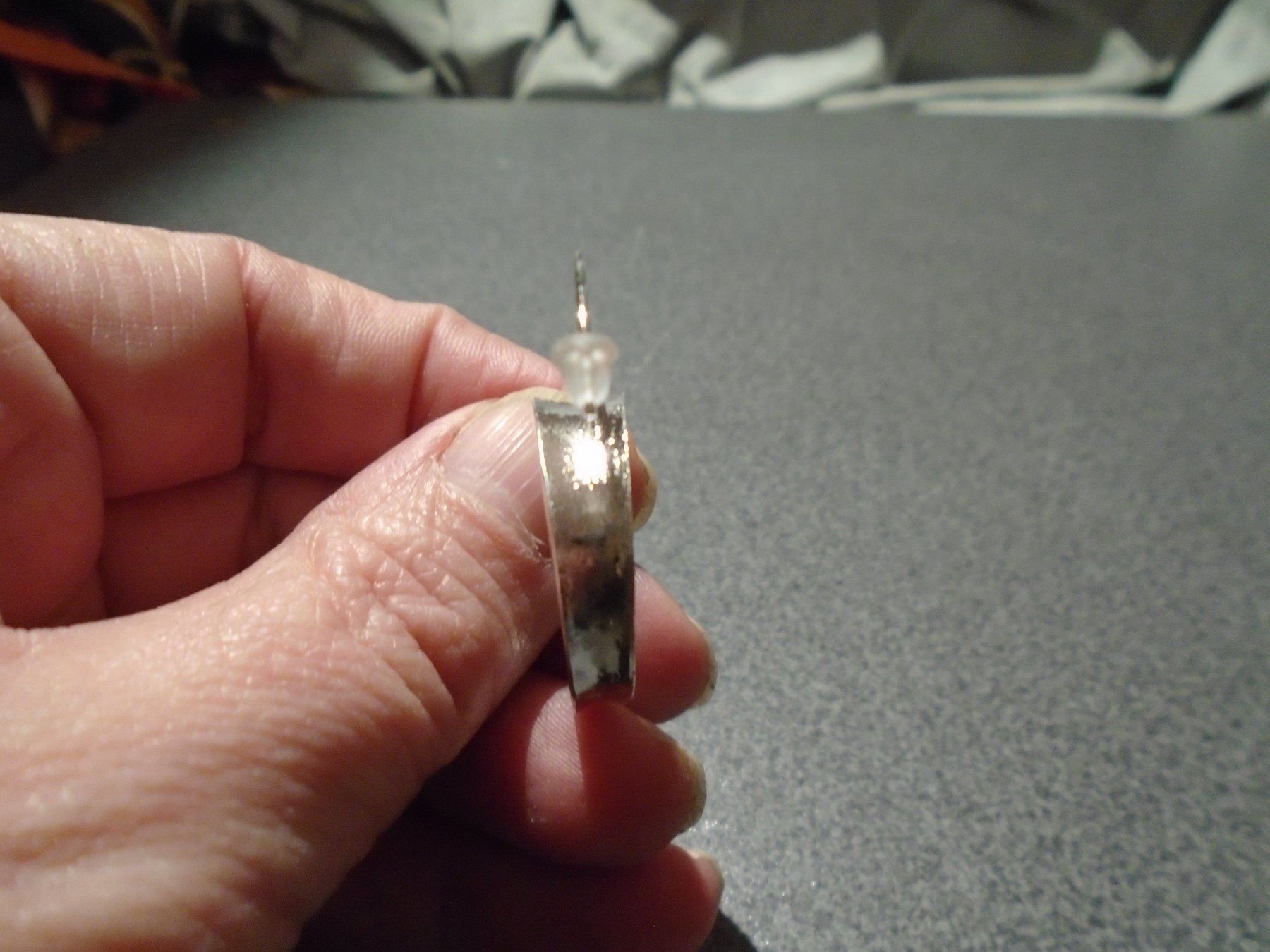 Ohrringe & -stecker: Ohrstecker silberfarbig, eingerollt – Neu und originalverpackt aus Zürich von abraxas1291 1