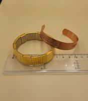 Goldige und Bronze Armbänder/Armreifen