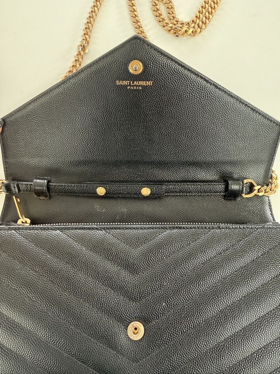 Saint Laurent Sacs femmes: Saint Laurent Tasche Schwarz mit Gold – D'occasion à Zürich par vintagewiedikon 1