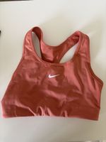 Brassière de sport Nike couleur rose, bon état 