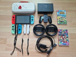 Nintendo Switch V1 ungepatcht + 4 Joy-Cons + Mario Kart +1