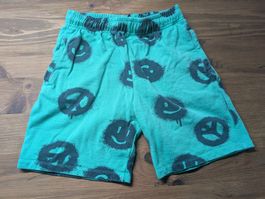 Molo Baumwolle-Shorts grün mit Smileys, Grösse 140