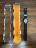 Montre Flik Flak enfant, noir et blanche, presque neuf!
