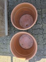 Two Plastic Plant Pots.