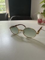 Sonnenbrille oval goldfarben mit Holzapplikation