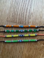 Armbänder mit türkischem Auge orange/grün/gelb