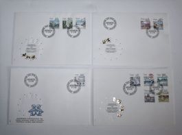 Briefmarken / Ersttagsbriefe 4er-Set Tierkreiszeichen