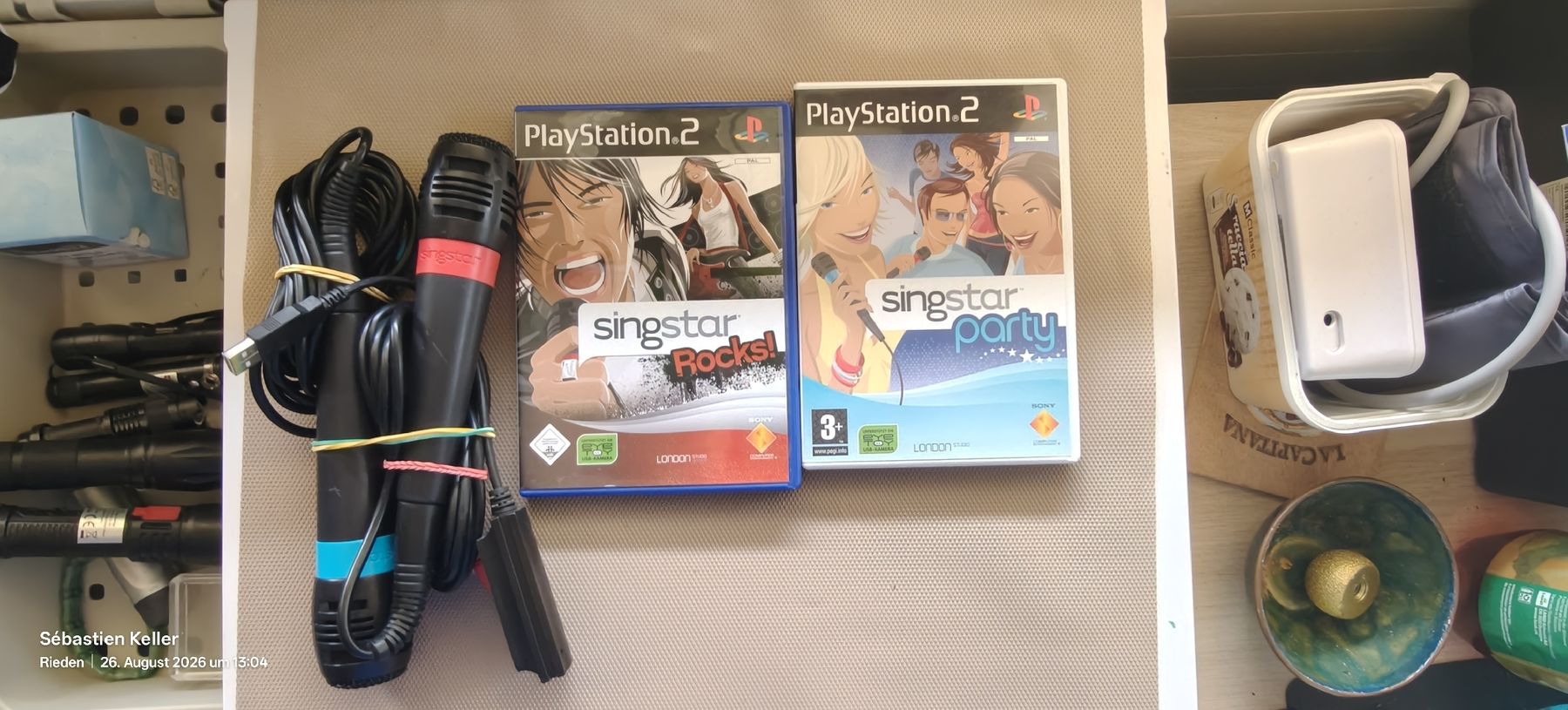 Sony Spiele: PS2 SingStar-Set mit 2 Mikrofonen, USB-Adapter & 2 Spielen – Gebraucht aus Rieden AG von Keller54