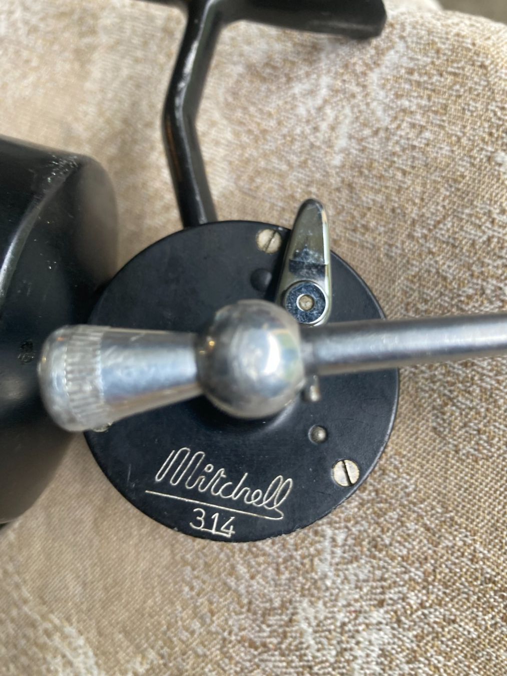 Tamburi & Mulinelli: Vintage Stationärrolle Mitchell 314 – Usato da Filzbach venduto da Sugi7 1