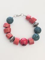 Beautiful natural red coral and lava stone veacelet