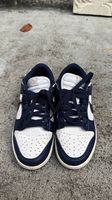 Nike Dunk Low in navy blue and white