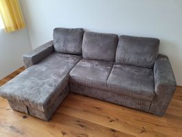 Stoffsofa grau mit Ablagefach 242x155