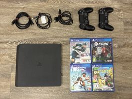 PS4 Konsole mit Controllern und Spielen 🎮