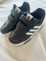 Scarpe Adidas bambini nere con strappi stato usato
