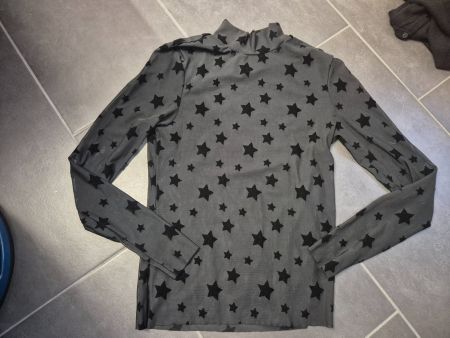 Black long sleeve mesh top with stars