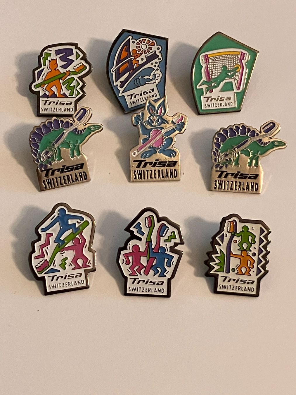 Placchette & Badge: 9 Pin Trisa Switzerland – Usato da Basel venduto da djwwpp