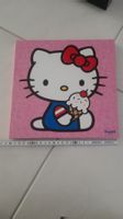 K.. B) Hello Kitty Bild