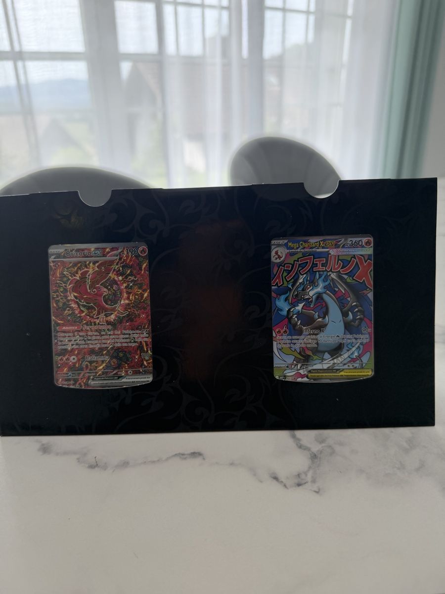 Pokémon Cartes à collectionner: CHARIZARD PIÙ ORICORIO ULTRA PREMIUM – Neuf avec emballage d'origine à Gossau ZH par giu_ncg9