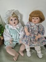 2 süsse sitzende Porzellanpuppen für Sammler