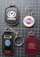 4 alte Autoschlüsselanhänger