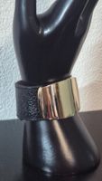 Bracciale pelle nero con fibbia dorata