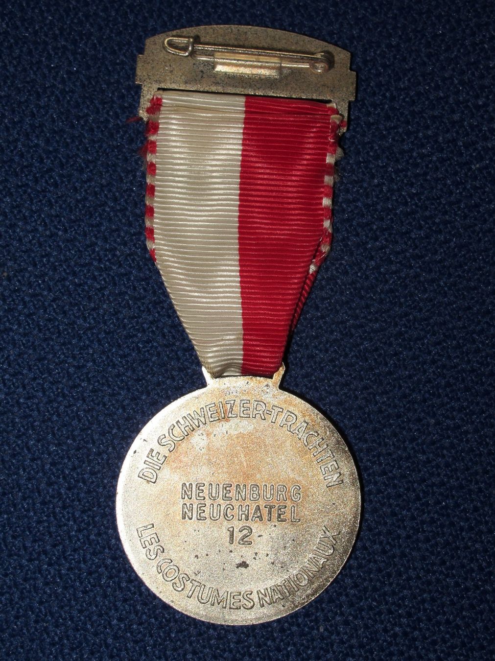Medaillen: Medalie Eidgen. Trachtenfeest Neuenburg 1961 – Gebraucht aus Wangs von Rumauch 1