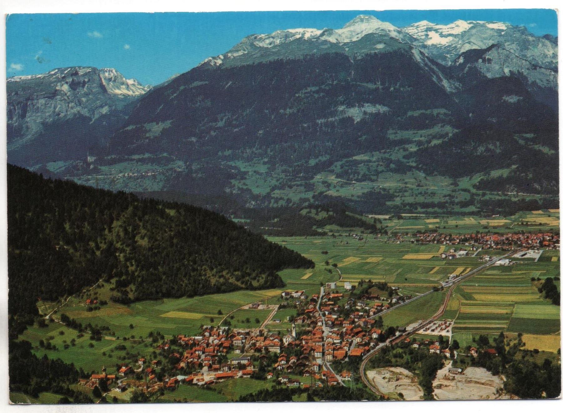 Cartoline postali: RHÄZÜNS Flugaufnahme – Usato da Jona venduto da philajona