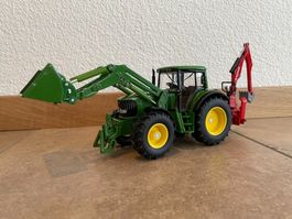 SIKU John Deere mit Heckbagger