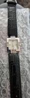 Montre à quartz avec strass, bracelet noir, occasion