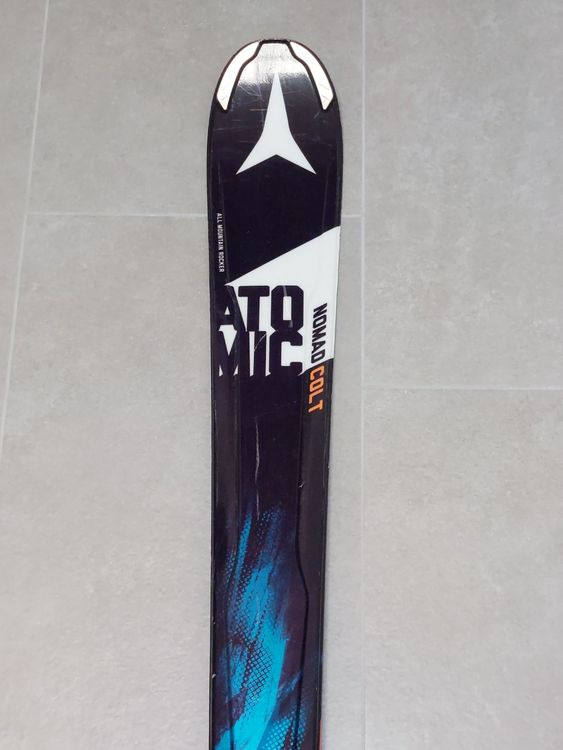 skis ATOMIC NOMAD BLACKEYE, black/green, all mountain rocker + Atomic XTO 12