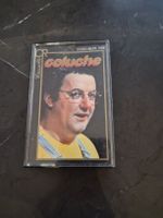 Cassette Audio Vintage de Coluche, Cassette Or, 1982.