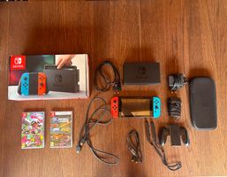 Nintendo switch pack complet avec deux jeux et pochette