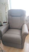 Fauteuil relax en cuir taupe électrique d'occasion