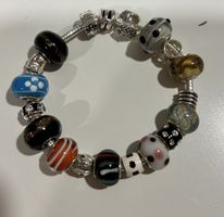 Charm-Armband mit vielen Glas- und Silber-Elementen