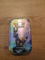 Prismatic Evolutions Tin En