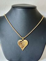 Gold plated steel necklace.