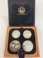 COFANETTO CON 4 MONETE IN ARGENTO MONTREAL 1976 nuovo FDC