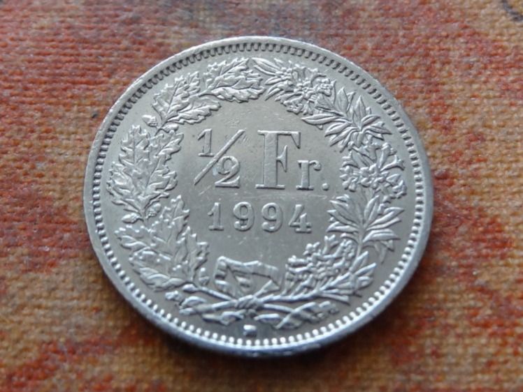Tutti le monete: 1/2 Fr. 1994 – Usato da Romanel-sur-Lausanne venduto da Swift13