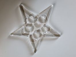 Bougeoir étoile en verre, fabriqué à Hergiswil, diam. 30 cm.