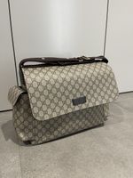 Sac à langer Gucci motif GG supreme beige bon état