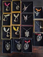 Lot 15 pendentifs dragons et co